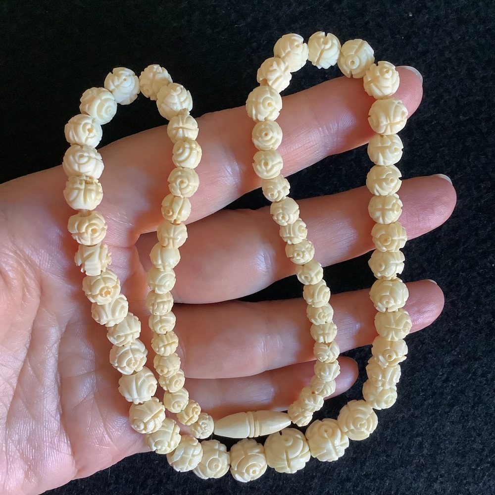 Vintage hand carved bone necklace.